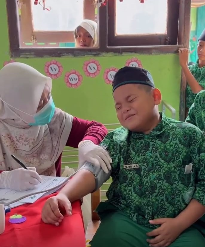 Cek dan Sosialisasi Kesehatan Gratis MI Raudhatul Muta’allimin 1